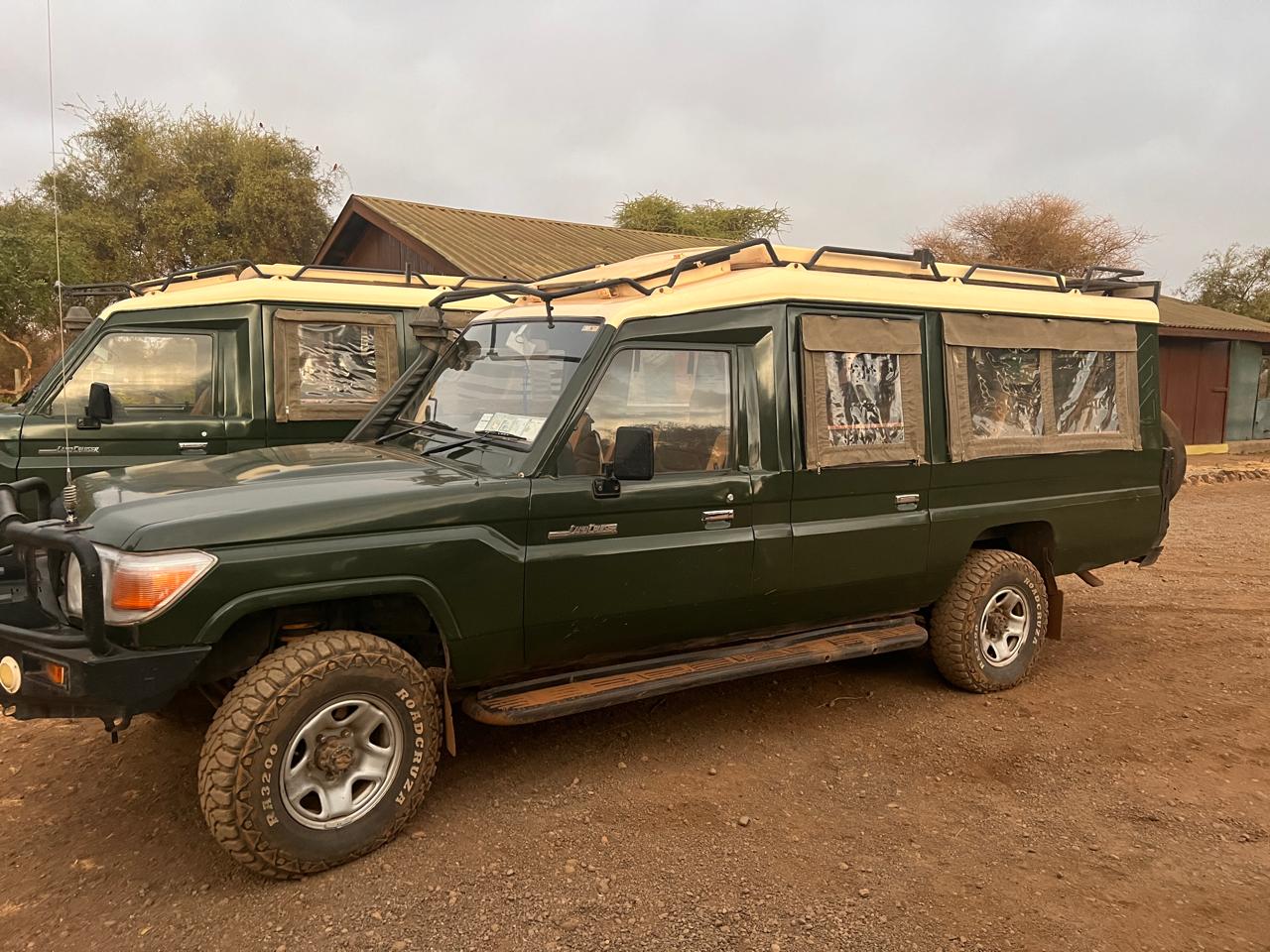 Semi-closed safari Land Cruiser option with a mix of comfort and open viewing