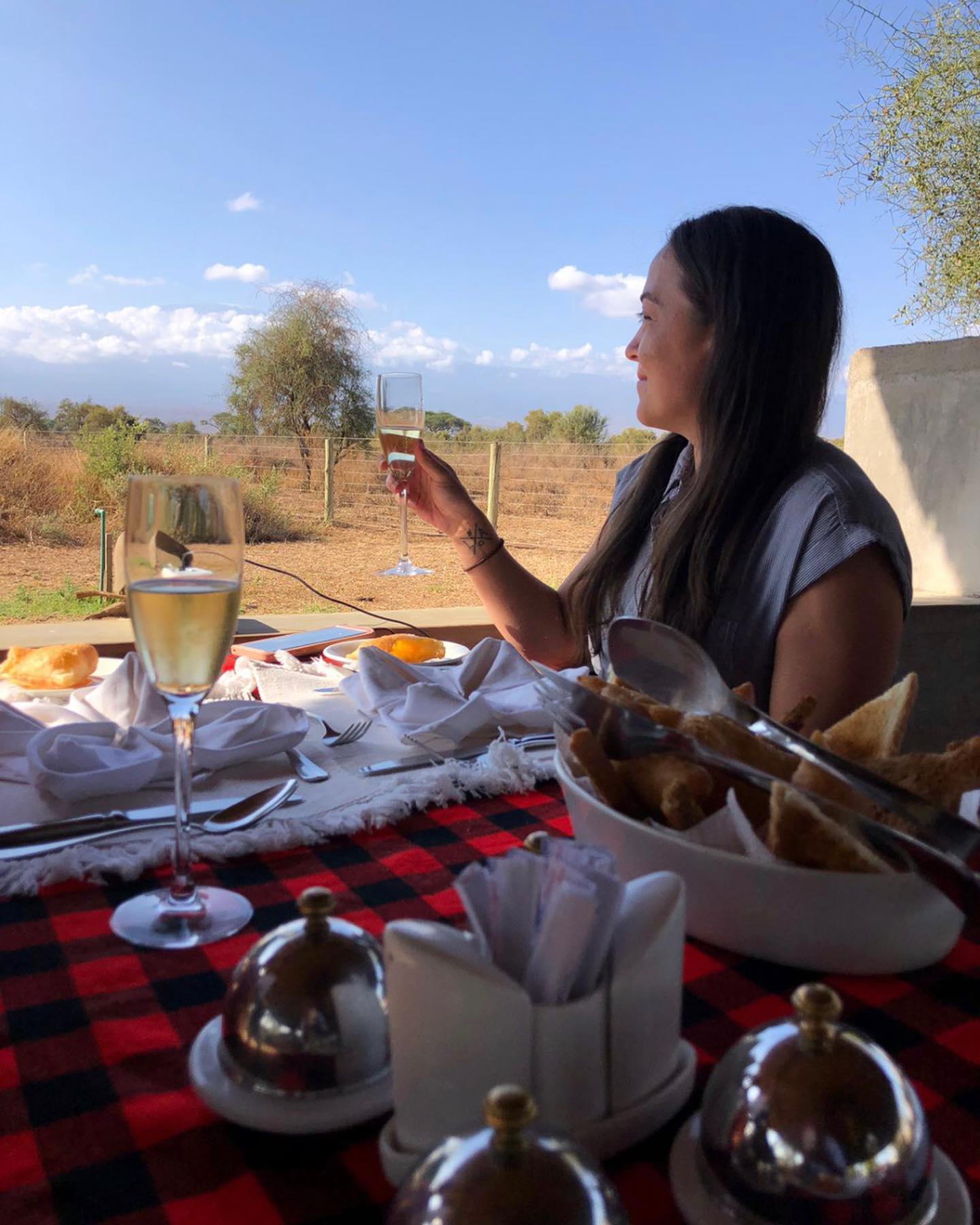 Guests enjoying breakfast with views of Mount Kilimanjaro after a balloon flight