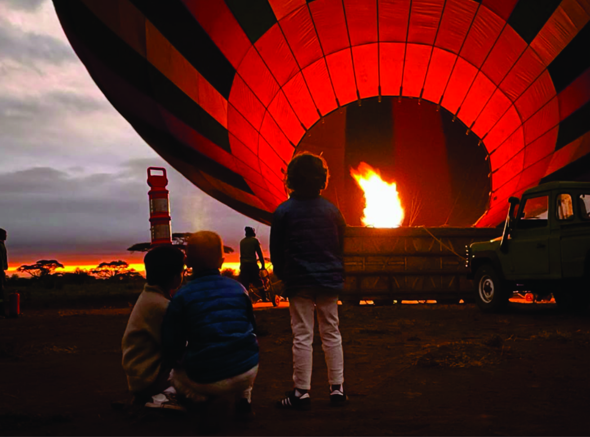 Guests checking in at balloon camp before sunrise in Amboseli, Kenya