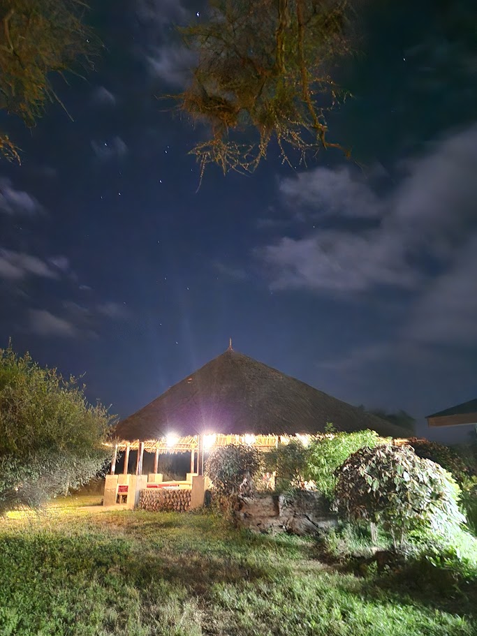 Guests enjoying a post-flight breakfast with proper facilities and views toward Mount Kilimanjaro
