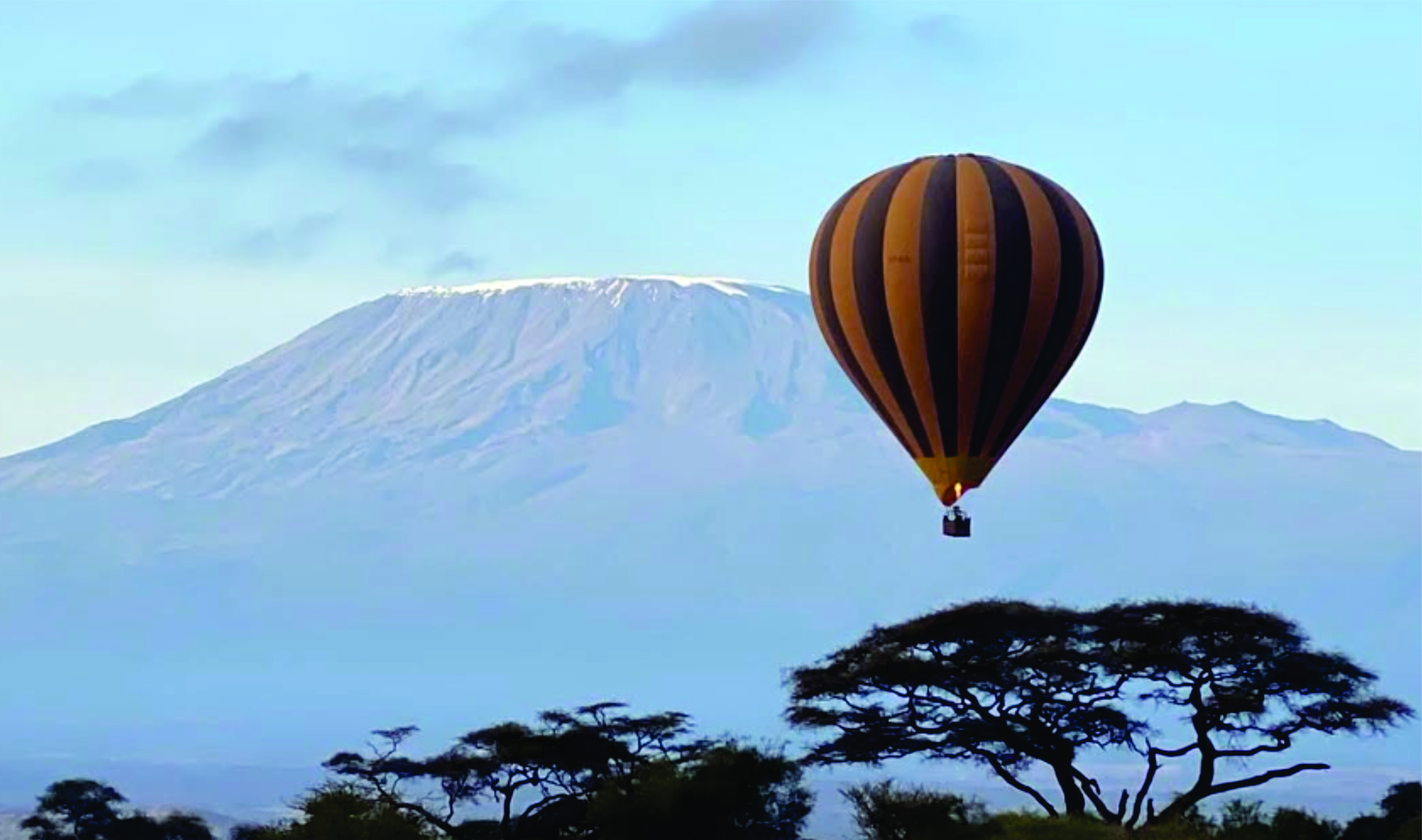 Mount Kilimanjaro with clouds above the Amboseli plains